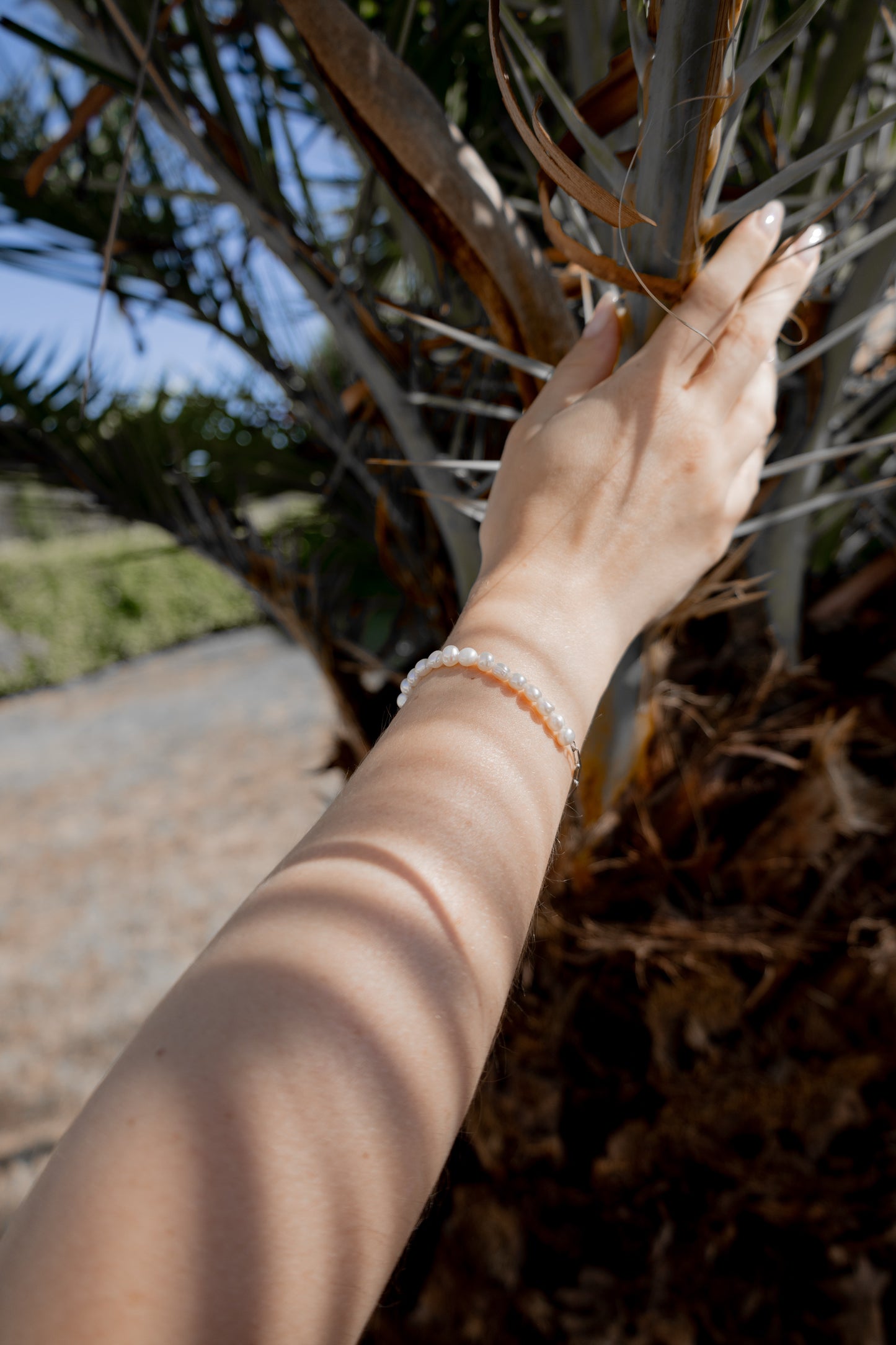 Elegantes Perlen-Armband – Schimmernde Perlen mit feinem silbernen Kettenverschluss